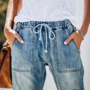 Ripped lace-up white trouser jeans